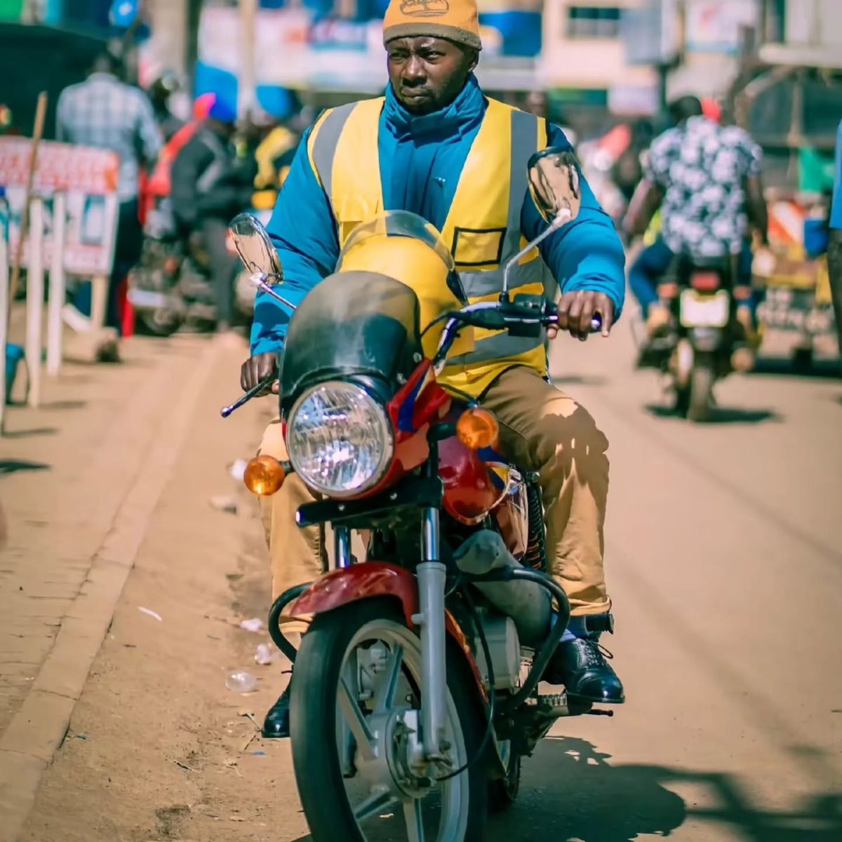 African bike rider delivering across town